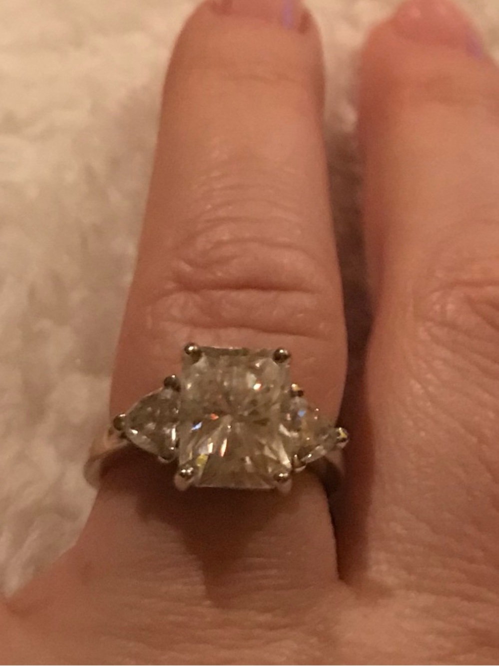 Colorless Moissanite 3 carat engagement ring set in rhodium.  Size 6.